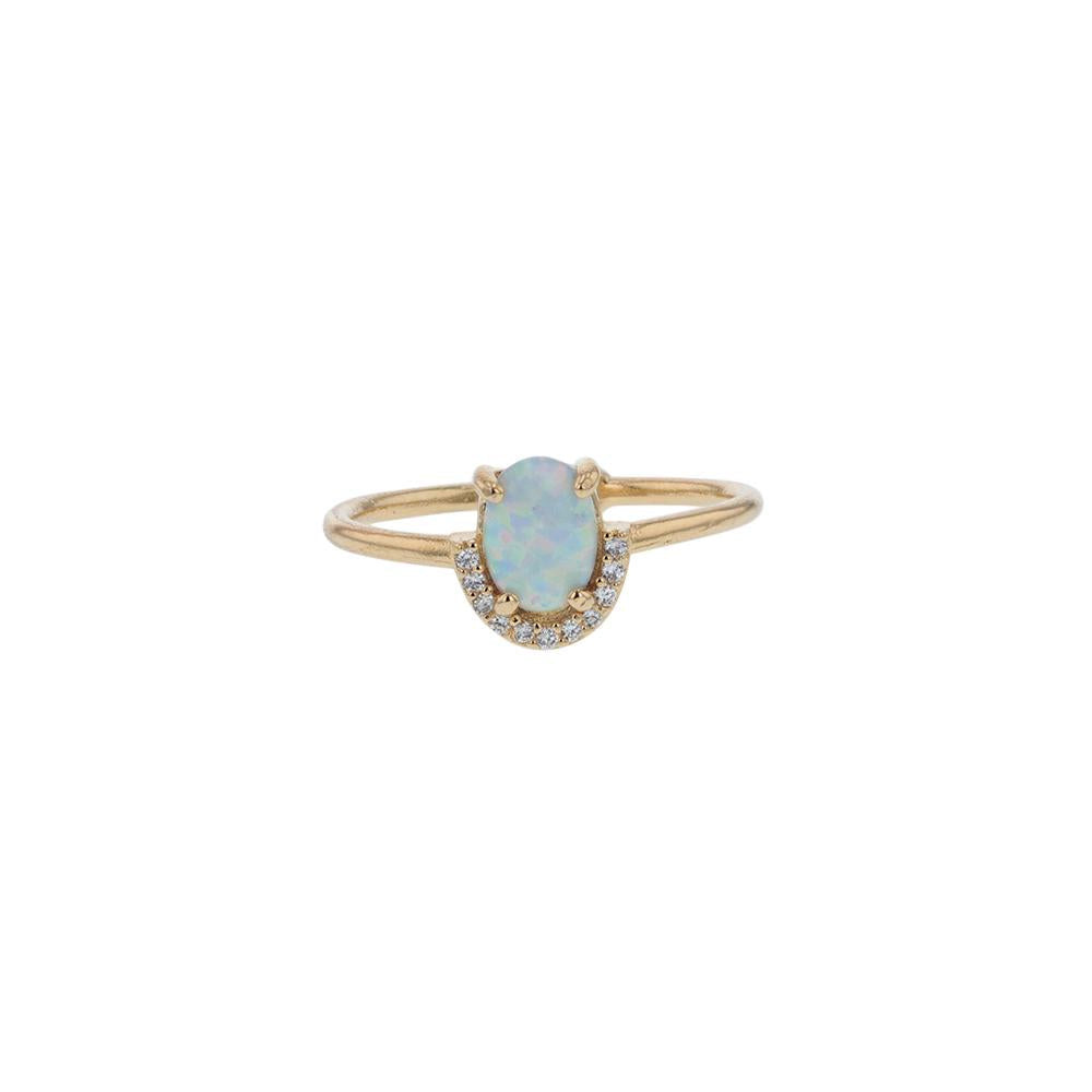 Ring with faux opal oval